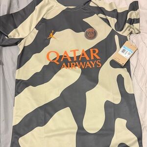 Jordan Paris Saint-Germain Camo Jersey in Olive Green, Black & Orange